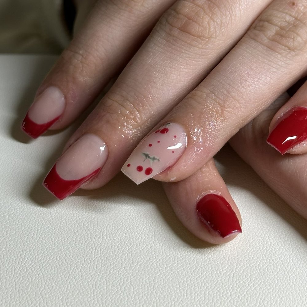 Deep red French acrylic set with a hand-painted cherry accent nail